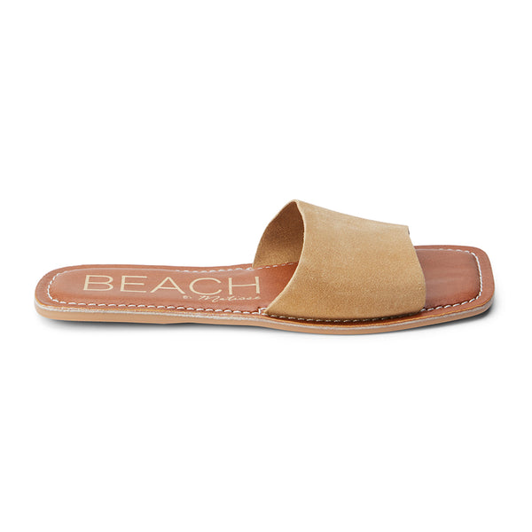 Cream suede slide sandals with a simple single-band design, perfect for casual summer wear and effortless style.