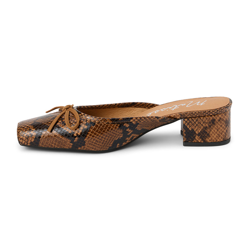 Stylish brown snake print mule heel with a square toe and bow detail. Trendy and versatile for any wardrobe.