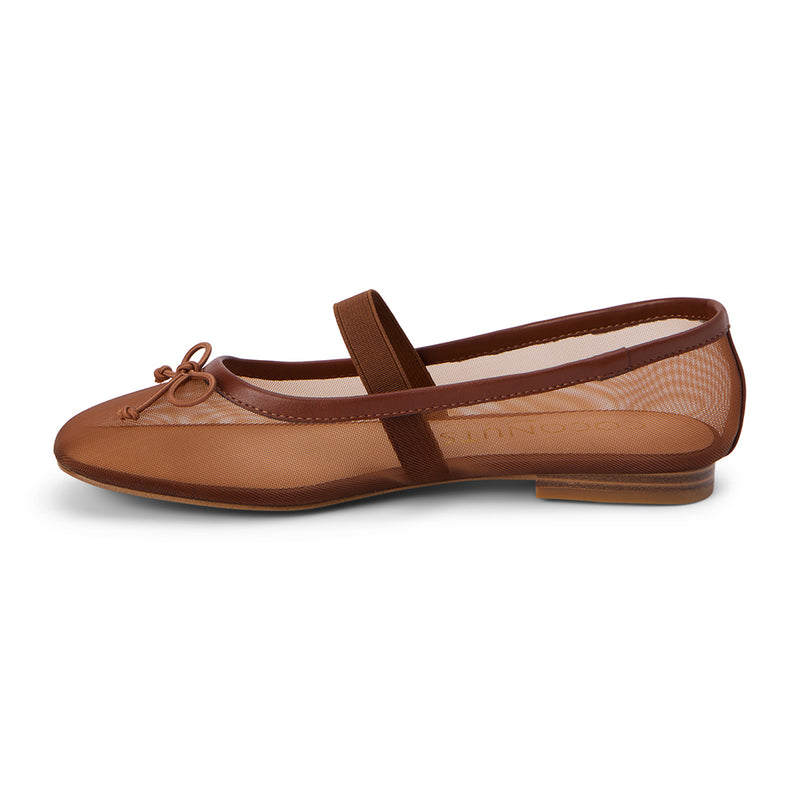 Chocolate mesh ballet flats with a breathable sheer design, delicate bow detail, and secure elastic strap. A modern take on a classic silhouette, perfect for effortless everyday wear.