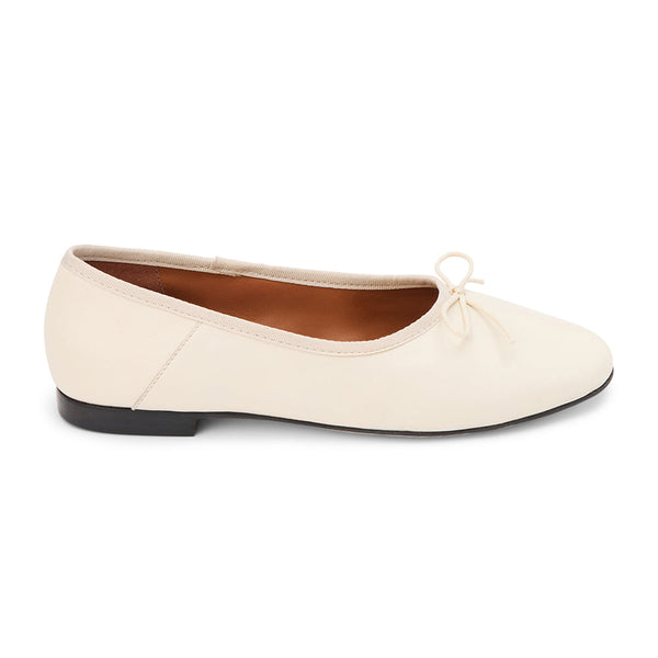 Ivory leather ballet flats with a classic round-toe silhouette, delicate bow detail, and padded leather insole. A timeless essential for effortless everyday elegance.