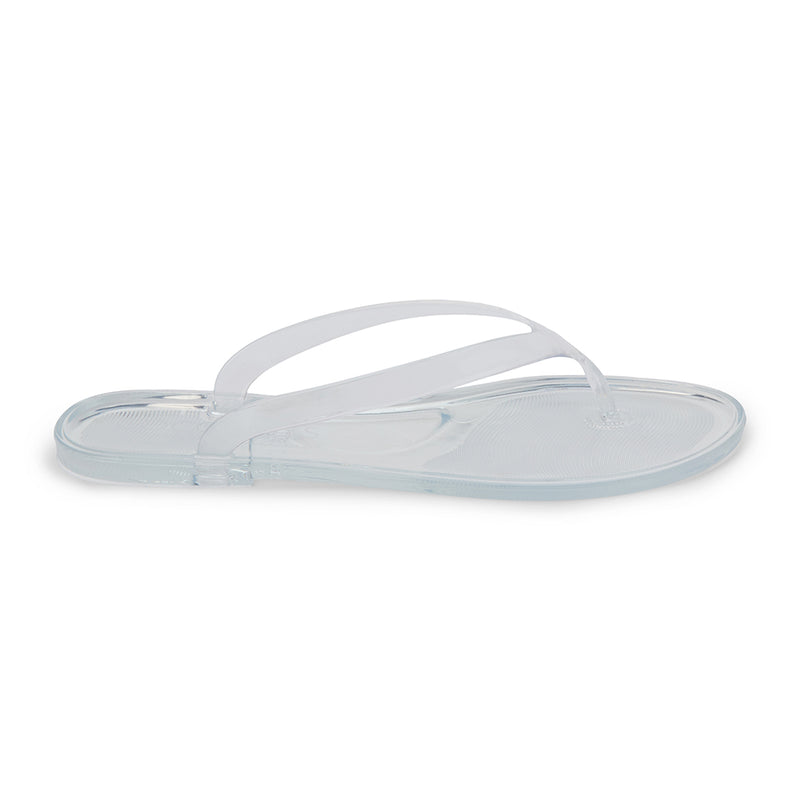 Translucent jelly flip-flops with transparent straps and a minimalist design. A lightweight, water-friendly essential for effortless summer wear.