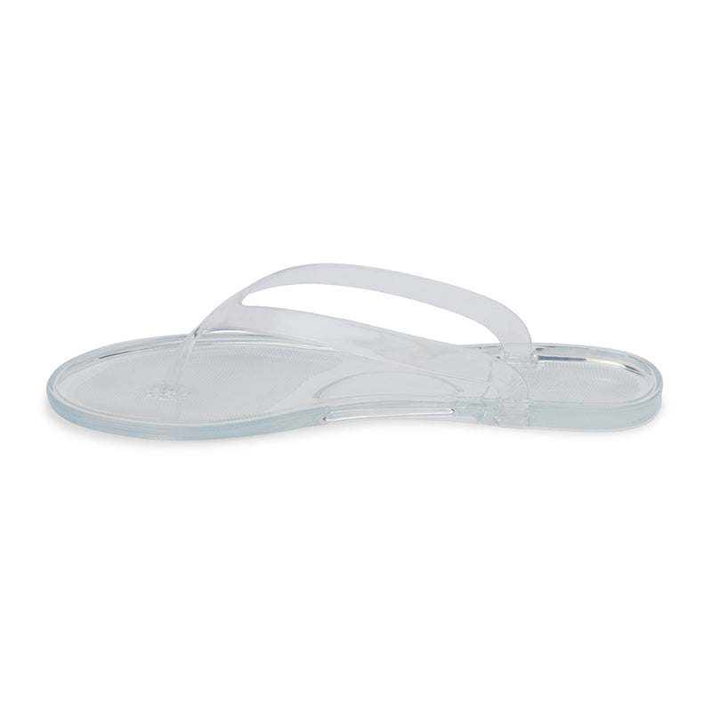 Translucent jelly flip-flops with transparent straps and a minimalist design. A lightweight, water-friendly essential for effortless summer wear.