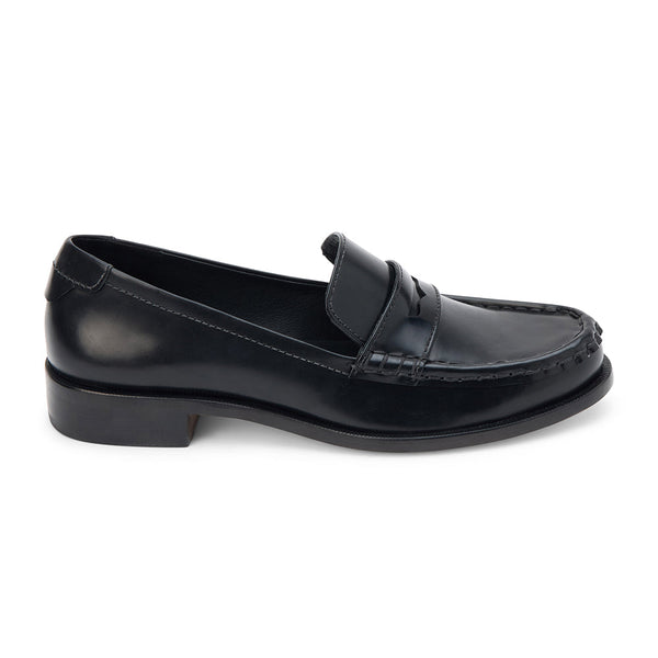 Black leather penny loafers with a polished finish, classic moccasin stitching, and a low stacked heel. A timeless staple for effortless sophistication.